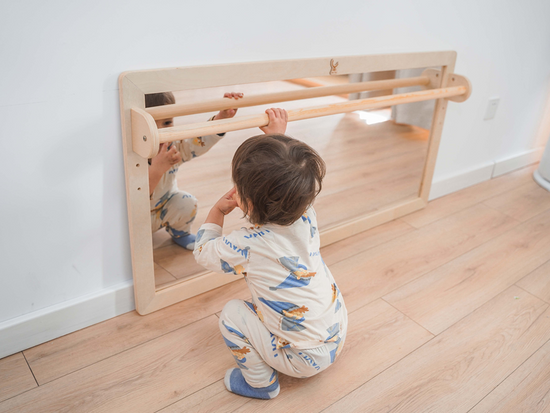 Montessori-Inspired Learning-to-Walk Mirrors: A Journey of Discovery